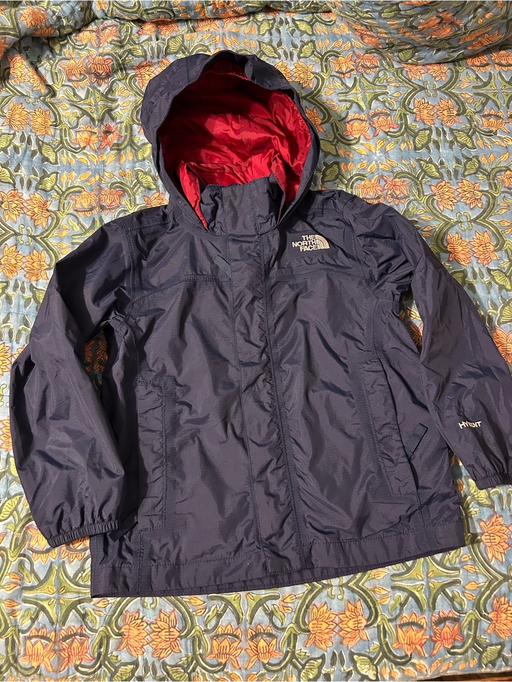 The North Face Kids' Hooded Raincoat - Navy Exterior with Red Lining